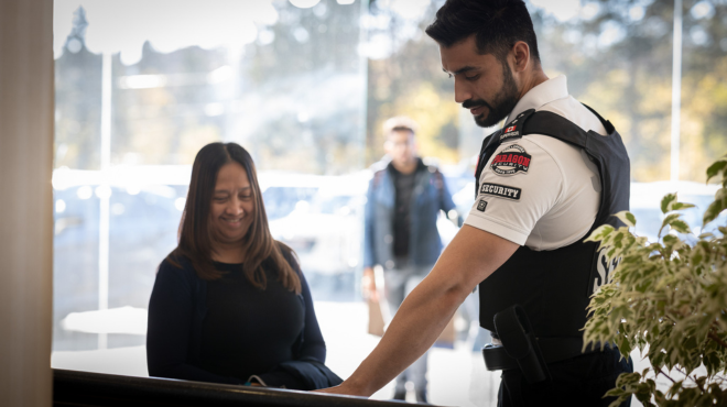 Security Guard helping a Layman