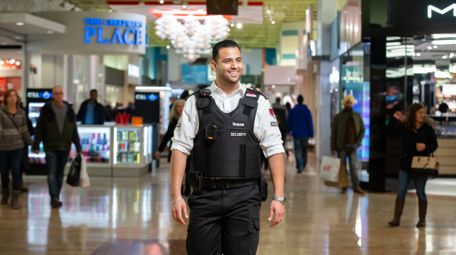 Security guard on patrol in retail centre