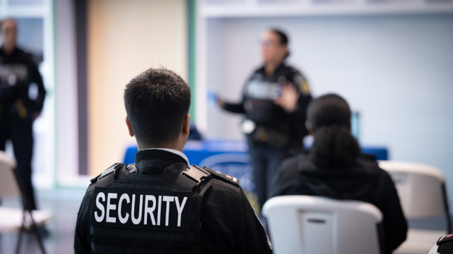 Security guard in basic security training class